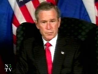 Президент Буш вмешался в забастовку докеров на западном побережье и волевым решением прекратил ее