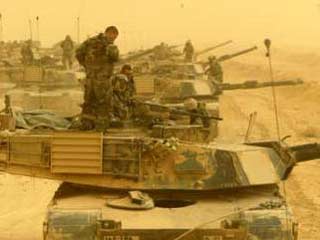 В среду американские войска, передвижение которых было крайне затруднено страшными песчаными бурями, продолжили движение по территории Ирака