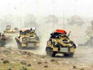 Американо-британские силы начинают наступление на позиции иракских дивизий республиканской гвардии, обороняющих Багдад