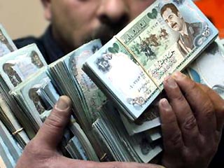 В Ираке в настоящее время в обращении два типа динаров