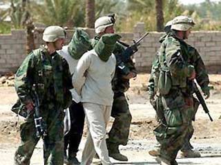 Силы коалиции задержали во время облав в центральных районах Ирака 876 человек