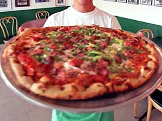 Потребление пиццы может снизить риск заболевания некоторыми видами рака. Такой вывод был сделан исследователями из миланского института фармакологии в результате обследования свыше 8000 итальянцев