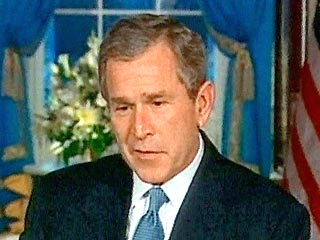 Получив два важных "рождественских подарка" - захват Саддама Хусейна и отказ Муамара Каддафи от арсенала средств массового поражения - президент Буш теперь желает получить и третий подарок