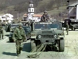 Международные силы по стабилизации в Боснии (СФОР) ведут интенсивные поиски в городе Пале бывшего лидера боснийских сербов Радована Караджича