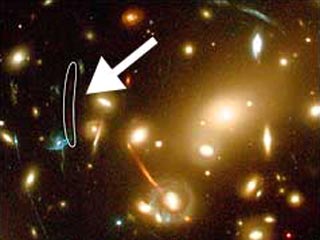 Международной команде ученых с помощью космического телескопа Hubble удалось сфотографировать самый отдаленный от земли объект - новую галактику, находящуюся на расстоянии 13 млрд световых лет от Земли