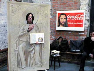 Среди экспонатов, в частности, была икона Спасителя на фоне рекламы "Coca-Cola"  с  надписью  "Сие  есть кровь моя"