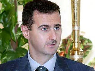 Башар Асад в поздравительной телеграмме призвал также Буша к установлению всеобъемлющего и справедливого мира на Ближнем Востоке на основе соответствующих резолюций Совета Безопасности ООН и принципа "земля в обмен на мир"