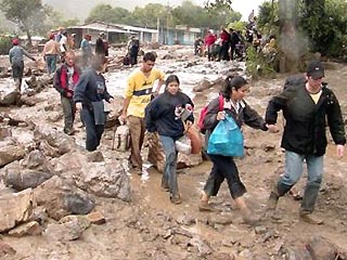В результате сильного наводнения и оползней, обрушившихся на города Венесуэлы, погибли, по меньшей мере, 37 человек