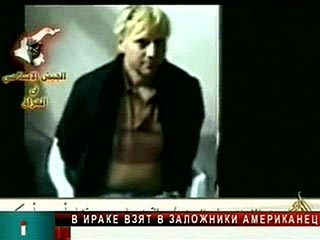 Al-Jazeera показала видеокадры, на которых снят человек, представленный как американский заложник