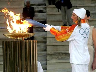 Олимпийский огонь начинает эстафету по Италии