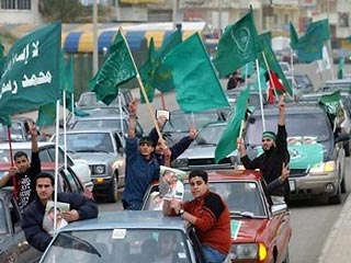 Движение "Хамас" победило на парламентских выборах на палестинских территориях и, как ожидается, ему будет поручено сформировать новое палестинское правительство