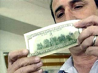 Курс доллара на ММВБ вырос на 9 копеек до 26,76 рубля