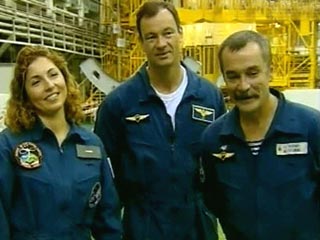 Экипаж 14-й экспедиции - россиянин Михаил Тюрин и астронавт NASA Майкл Лопес-Алегриа, а также первая женщина - Аньюша Ансари
