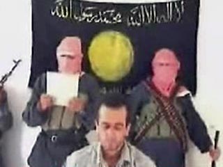 Видеозапись казни турецкого заложника боевиками экстремистской группировки "Каида аль-джихад в Ираке" размещена сегодня в Интернете