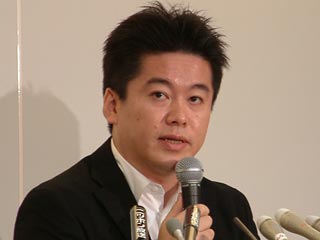 В Японии основатель интернет-пузыря Livedoor приговорен к тюрьме на 2,5 года 	