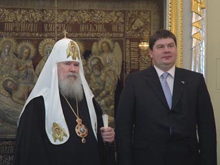 На фото Патриарх Алексий II и глава правительства Латвии А.Калвитис