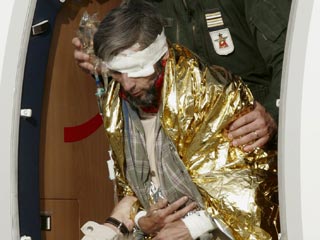 Французский заложник Эрик Дамфревиль доставлен сегодня военным самолетом на родину