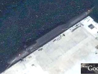 Новую китайскую стратегическую атомную подводную лодку обнаружили в китайском порту Далянь с помощью коммерческого спутника Quickbird