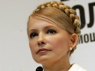 Коровы от Партии регионов мешают встречаться с избирателями, заявила Тимошенко.