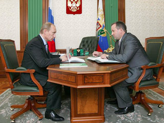 Глава Сбербанка Андрей Казьмин рассказал Путину о прибыли банка и ушел с работы