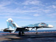 На борту "Кузнецова" во время похода "будет порядка 15 истребителей Су-33 и МиГ-29К/КУБ и более десяти вертолетов Ка-52К, Ка-27, Ка-31"