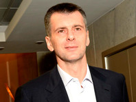 Прохоров встретился с руководством РБК и привлек юристов "Онэксима" для решения спора с "Роснефтью"