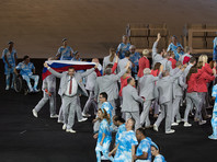 Белорусские паралимпийцы все же пронесли российский флаг на открытии Игр в Рио в знак солидарности со сборной РФ
