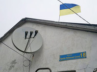 Жителю Крыма, вывесившему на своем доме украинский флаг и табличку "Улица героев Небесной сотни", грозят полицией