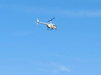 На МКАД аварийно сел вертолет с обледеневшим винтом
