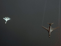 Перехват бомбардировщиков США российским Су-27 сфотографировали с борта самолета
