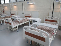 Власти Питера заполняют госпиталь для "ковидных" больных в "Ленэкспо", несмотря на нехватку персонала: "Это лучше, чем в палатке"