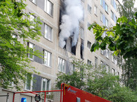 Работа пожарно-спасательных подразделений по ликвидации возгорания в жилом доме