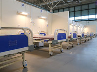 Временный госпиталь для больных COVID-19 в помещениях выставочного комплекса Ленэкспо
