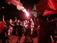Гуляния португальских футбольных фанатов после победы их сборной переросли в столкновения с полицией