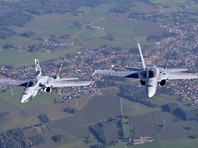 Когда самолет находился в воздушном пространстве Швейцарии, в непосредственной близости от спецборта были два истребителя F/A-18 Hornet