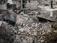 РИА передает, что практически все здания в лагере Хандарат разрушены. Саперы уже завершили осмотр большинства улиц, и сирийская армия спецтехникой расчищает центральные дороги