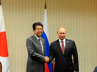 Путин обсудил с Абэ предстоящий визит в Японию