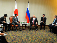 Президент России Владимир Путин провел встречу с премьер-министром Японии Синдзо Абэ на полях саммита АТЭС в Перу