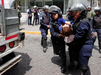 Число жертв протестов, которые на протяжении шести недель продолжаются по всей Венесуэле, возросло до 39 человек