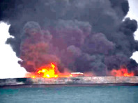 У берегов Китая после столкновения с сухогрузом загорелся танкер, более 30 моряков пропали

