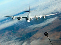 Американские истребители F-22 вылетели на перехват двух российских стратегических бомбардировщиков-ракетоносцев Ту-95 в небе к западу от побережья штата Аляска

