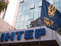 В Киеве националисты заблокировали телеканал "Интер", требуя отменить программу ко Дню Победы