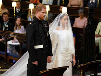 Днем 19 мая Букингемском дворце начинается долгожданная свадебная церемония: женятся 33-летний британский принц Гарри и его американская невеста - 36-летняя актриса и фотомодель Меган Маркл