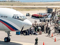 Самолеты Ан-124 и Ил-62 с российскими военнослужащими и 35 тоннами груза прибыли в субботу в обслуживающий Каракас международный аэропорт Майкетия имени Симона Боливара

