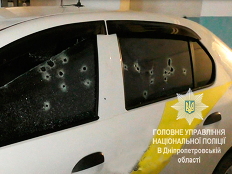 В украинском Днепре грабители расстреляли из автомата бизнесмена и его охранников