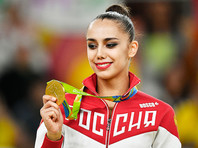 Россиянка Маргарита Мамун выиграла золото в личном многоборье, опередив подругу по команде Яну Кудрявцеву, которая становилась абсолютной чемпионкой мира три года подряд
