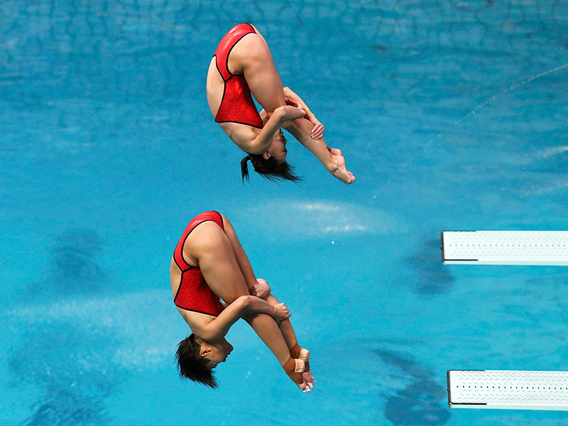Китаянки Ши Тинмао и Ву Минься завоевали золотые медали в синхронных прыжках в воду с трехметрового трамплина на Олимпийских играх - 2016 в Рио-де-Жанейро
