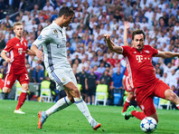 Мадридский "Реал" вышел в полуфинал Лиги чемпионов УЕФА, одолев на своем поле мюнхенскую "Баварию" в дополнительное время ответного четвертьфинального матча со счетом 4:2