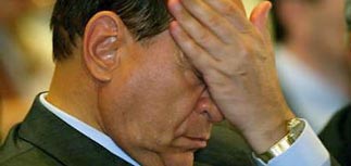 Берлускони получил четыре года тюрьмы, но попал под амнистию